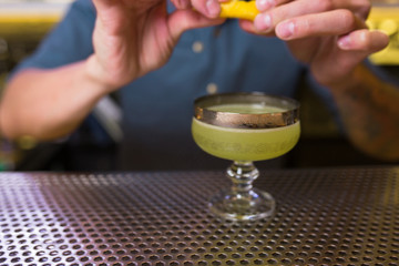 Green White Cocktail drink -beverage on a bar counter .  Selective focus on the foreground glass, Top view . Trendy stylish edit . Copy paste space for design concept service barmen concept