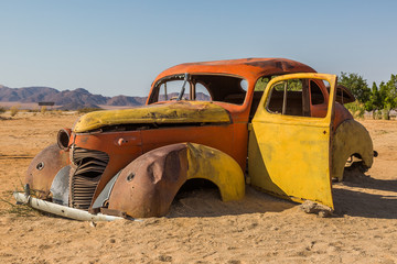 Abandoned vehicle wrecks in the desert of Namibia, Africa
