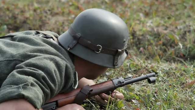 Historical reconstruction of Second World War. Soldiers on battle field during assault ,hostilities of Second World war, Russian