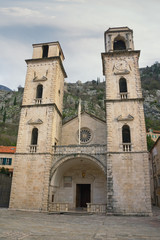 Fototapeta na wymiar Religious architecture. Montenegro, Old Town of Kotor - UNESCO World Heritage site. Cathedral of Saint Tryphon on cloudy winter day