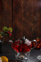 Red tea wooden background