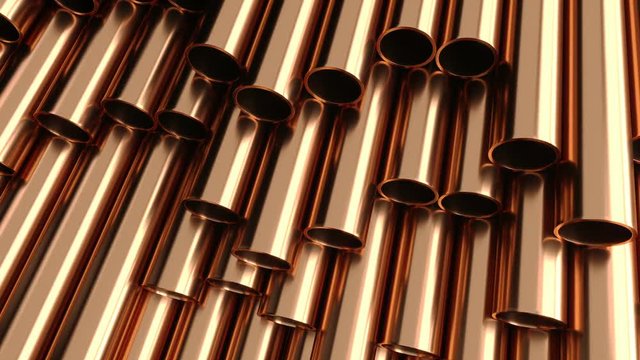 Set of copper pipes lying in one heap.