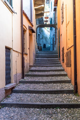 Fototapeta premium Beautiful picturesque and colorful old town street in Bellagio city, Como lake, Italy