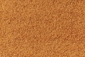 powdered brown sugar texture background close-up.Flat lay