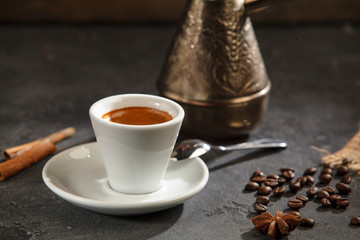 Coffee cup and saucer wooden background