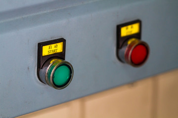 Buttons start and stop on control panel for control machine