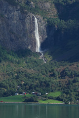 Waterfall on fjords by the fishing village of Skjolden - Norway
