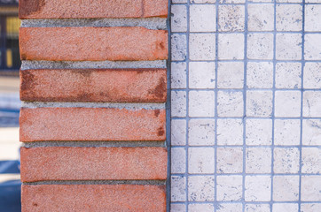 brick wall and ceramic tiles and cement mortar