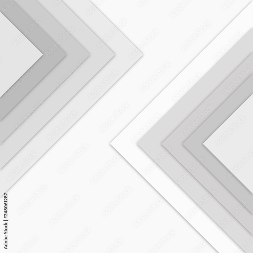 Poster large monochrome gray triangles with drop shadows on top of each others. simple abstract pattern for