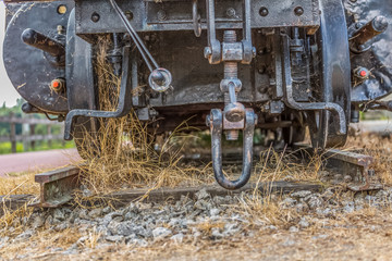Detailed view of a old wagon stretcher, rusty pieces antique system
