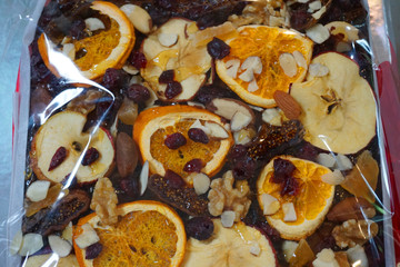 Fototapeta premium Delicious fruit cake with dried baked orange apple plum slice on top Christmas traditional foo sweet dessert homemade cake beautiful decoration food 