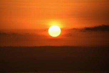 Sunrise and a shining spectacle of the seaside