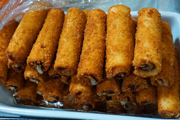 Deep fried bacon and cheese roll bread crumb crispy in rice brain oil with chillies dipping sauce delicious healthy breakfast 