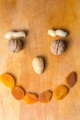 A smile made from vegetarian foods. The concept of vegetarianism.