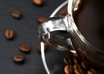Glass coffee cup with fresh made espresso (black background)