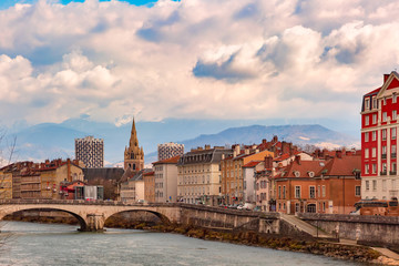 Church, Isere river and bridge in Grenoble, France