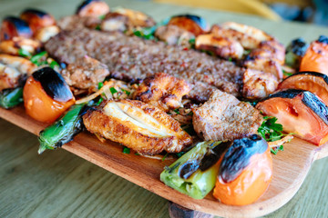 Traditional Turkish Adana Kebab or kebap meat food in Turkish Restaurant with salad