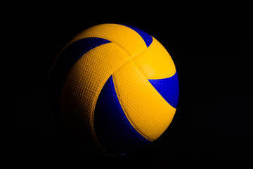 volleyball ball on black background.