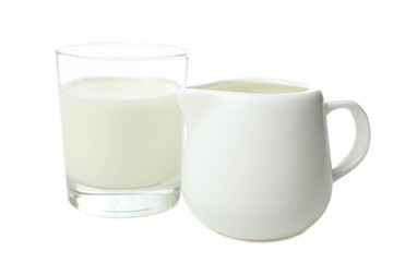 lass of milk and white  milk jug