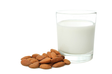 Glass cup of milk and almond nuts
