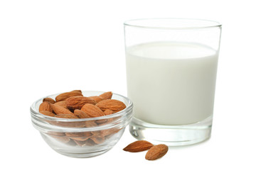Glass cup of milk and almond nuts