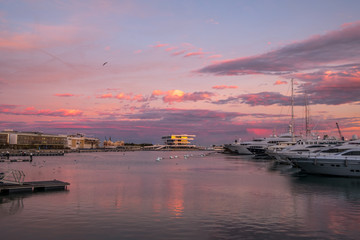 sunrise at the Valencia harbor, Spain Sunset at the port of Valencia, Spain colors in the sky and...