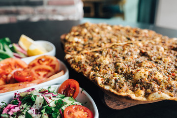 Traditional Turkish food Lahmacun. Also Known Turkish Pizza in Turkish Restaurant