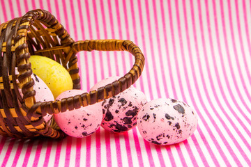 easter abstract gift card on pink and white textured background with easter eggs  laying wicker basket
