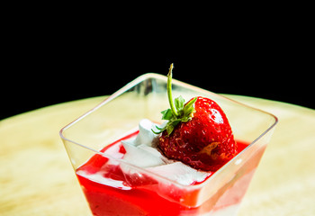 Pudding with strawberry , close up in studio