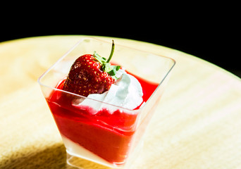 Pudding with strawberry , close up in studio
