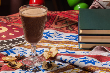 Irish Coffee cups with cream on a dark background, on the colorful background, warming cocktail