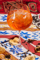 Two glasses of Italian Aperol Spritz alcohol cocktail with ice and blood orange slices selective focus, copy space, Summer refreshing cocktail drink with orange