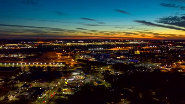 Atlanta Aerial v492 Sunset to night hyperlapse of airport with airplane and car traffic 12/18