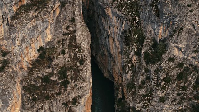 Aerial, Roacky mountains over bridge in Pindus
