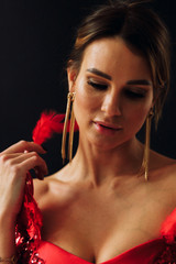 Fototapeta premium sexy girl in red dress.Girl on black background