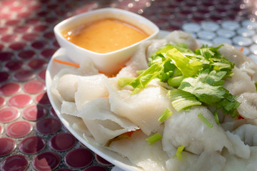 steamed fish dumplings and soy bean paste sauce