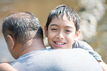 Son hug father with love