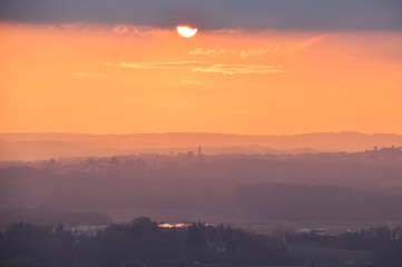 sunset over city fiery sunset against the background of a provincial Italian town