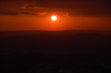 fiery sunset against the background of a provincial Italian town