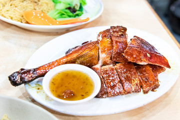 Serving of freshly roasted goose with crispy skin in restaurant