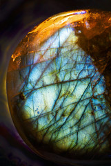 Macro photo of a blue crystal labradorite stone.  I accentuated the round shape to give it a surrealistic, science fiction planet look.