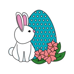 cute rabbit with easter egg painted in the garden