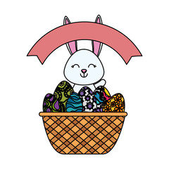 cute rabbit with easter eggs painted in basket