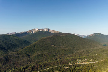 Fototapeta na wymiar green mountain ridge scene with blue sky summer landscape background.