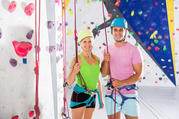 Couple posing before climbing workout
