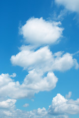 white clouds in the blue sky background