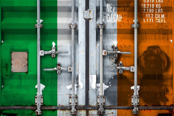 Close-up of a container with the national flag of Ireland. The concept of export-import Ireland and the national delivery of goods.