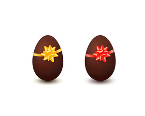 Realistic chocolate easter eggs with lush bow and ribbon