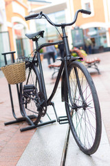 Fototapeta na wymiar Old bicycle of black color