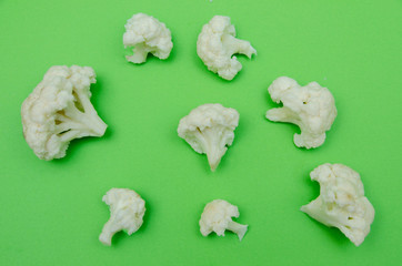 set of cauliflower top view, cauliflower on a green background